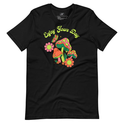 A black short sleeve shirt featuring a colorful 'Enjoy Your Day' mushroom design, combining comfort with a cheerful saying.