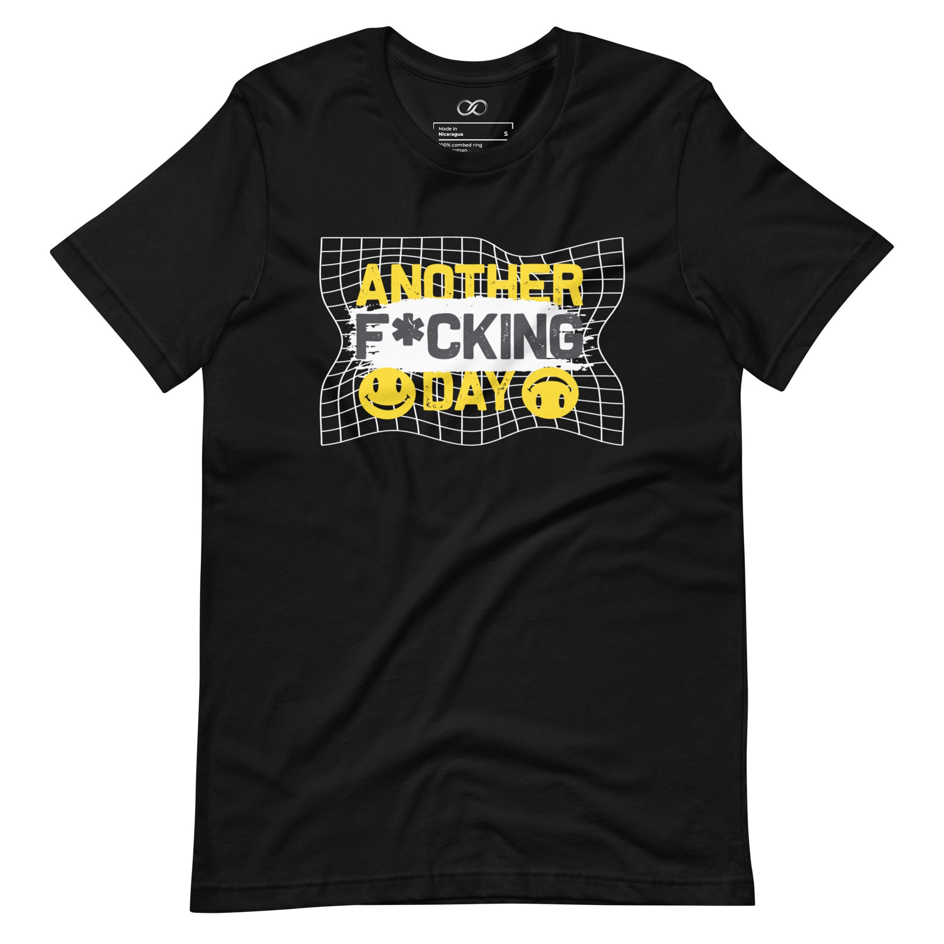 A black unisex t-shirt with a bold graphic print that reads 'ANOTHER F*CKING DAY' in yellow block letters, underscored by a grid pattern and accompanied by two smiling face emojis with the same bright yellow color, adding a sarcastic tone to the statement.