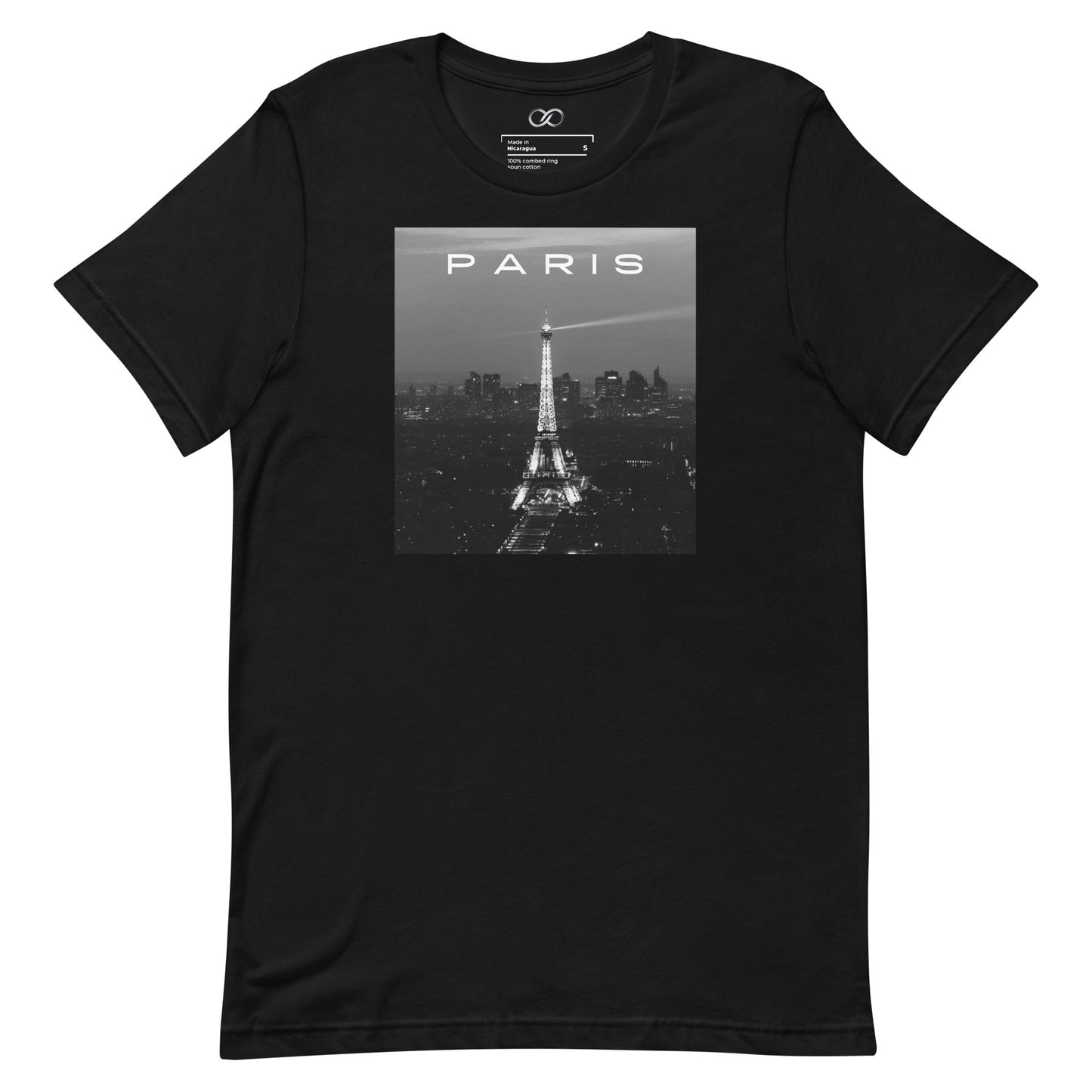 A black t-shirt laid flat showcasing a central photo print of the Eiffel Tower in Paris with a translucent white overlay text 'PARIS'.